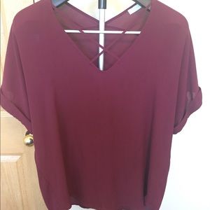 Lush criss crosses top